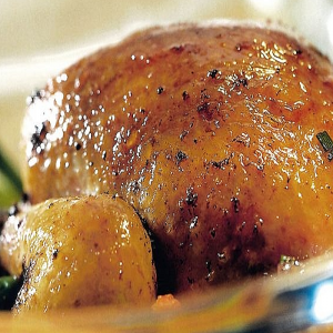 Roasted pigeon glazed with fig jam and peas